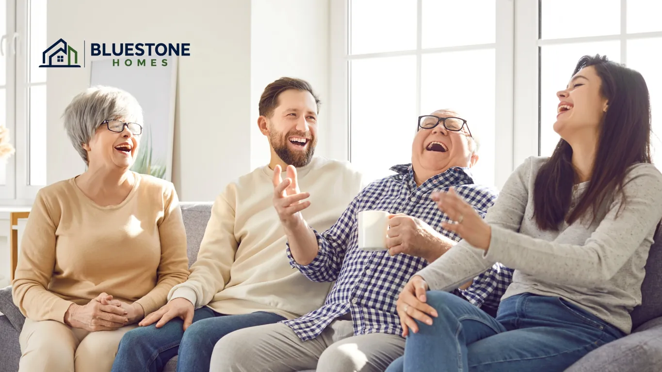 Adult child and parents enjoying private, comfortable living space together in a custom home.